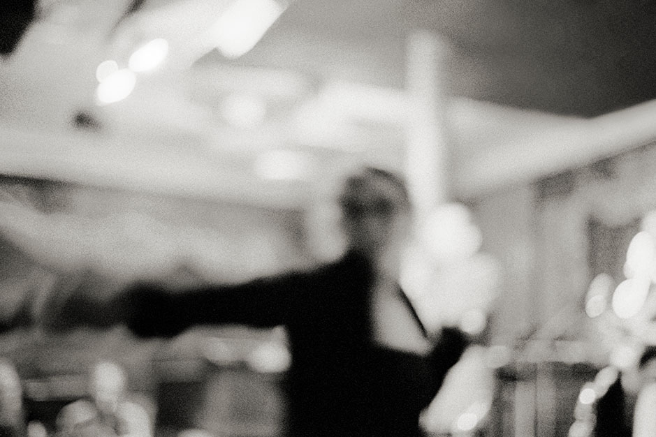An out of focus image of a woman dancing.