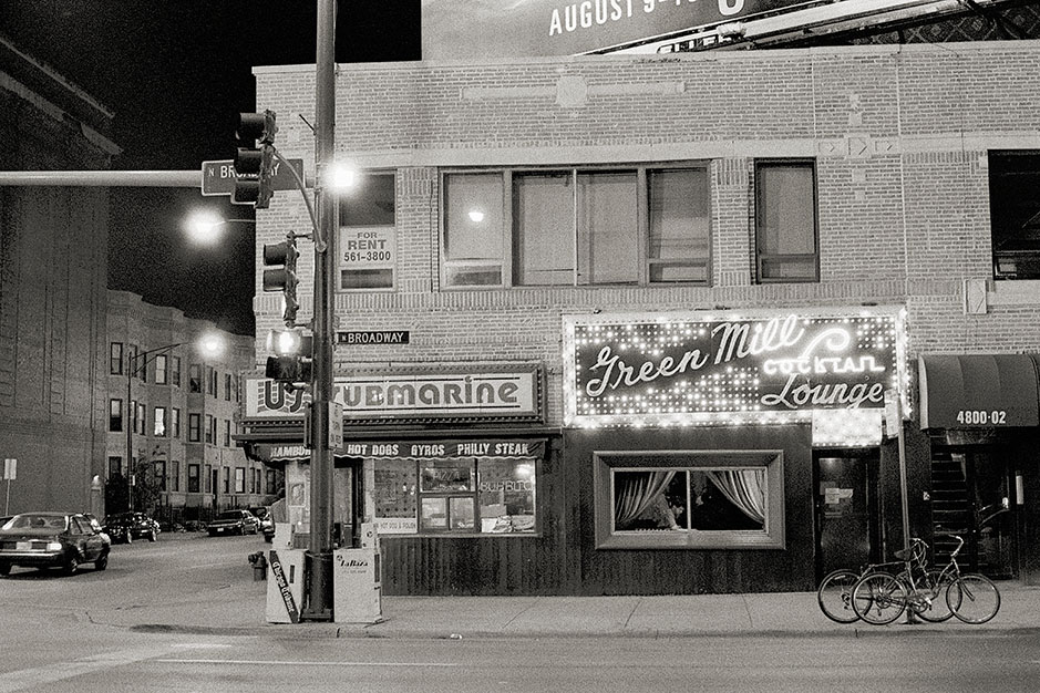 A view of the Green Mill, at Lawrence and Broadway, from outside at night.
