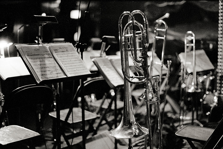 Musical instruments sit on the stage, ready to be played.