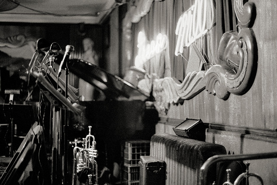 The stage is crowded with instruments.