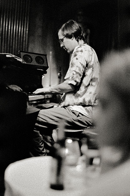 A man plays the organ.