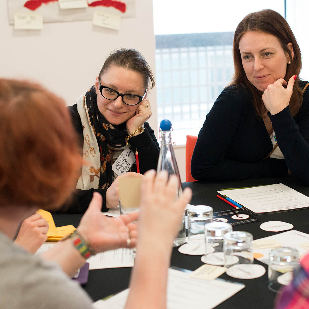A group of library workers play The Library Persuasion Game at a library conference.